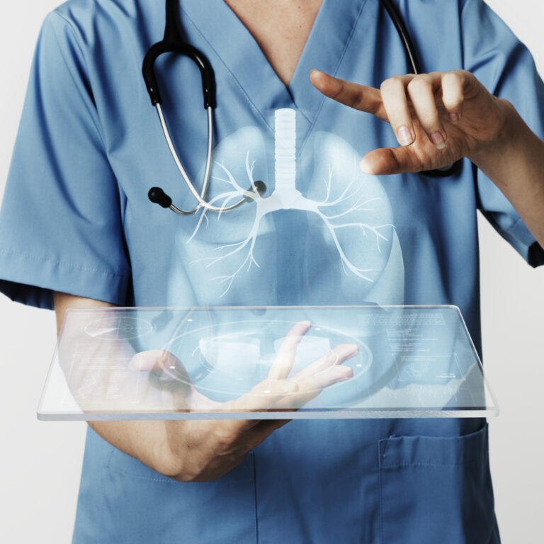 Doctors using transparent tablet with hologram medical technolog